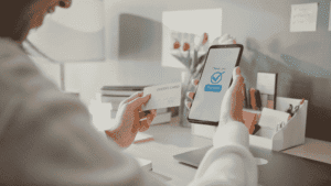 UK business owner receiving next day settlement notification on a digital device, symbolizing faster payouts and improved cash flow